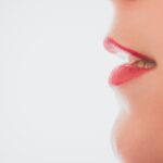 A woman breathing with an open mouth