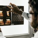 A dentist reading a dental X-ray