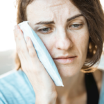 A woman experiencing toothache