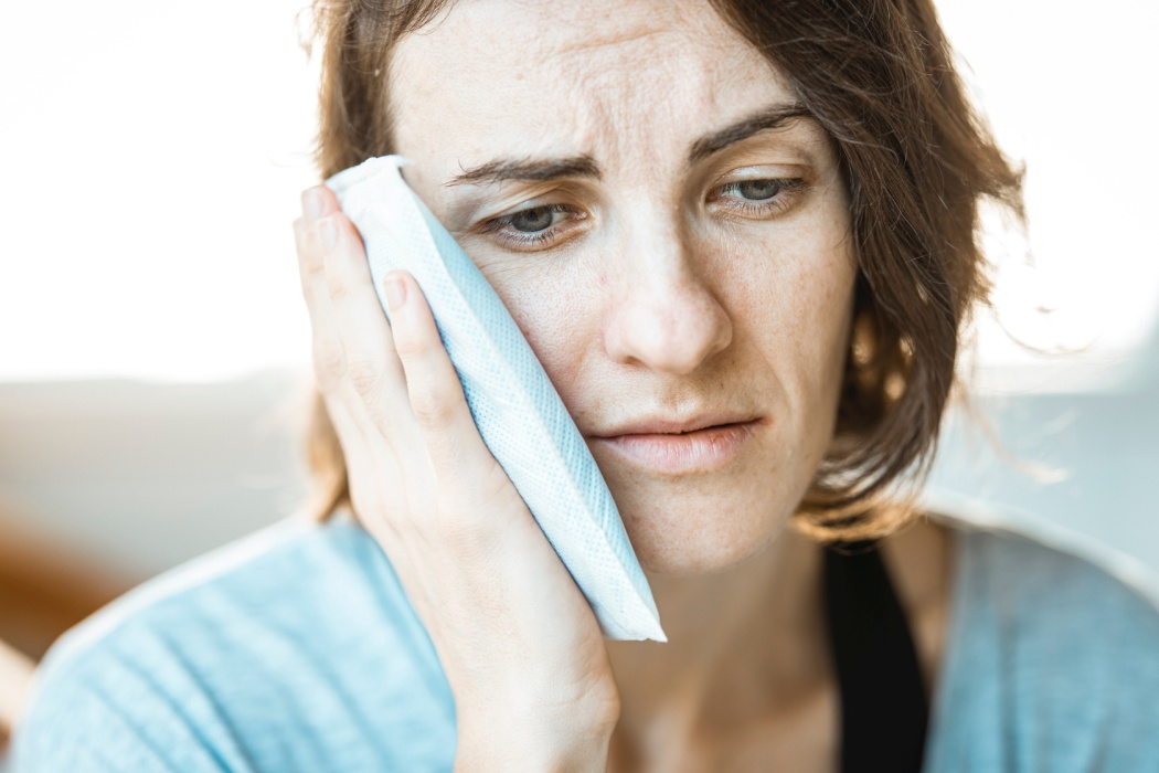 A woman experiencing toothache